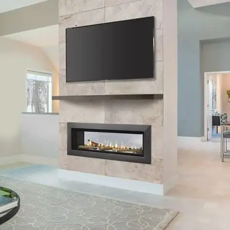 double-sided fireplace with TV above
