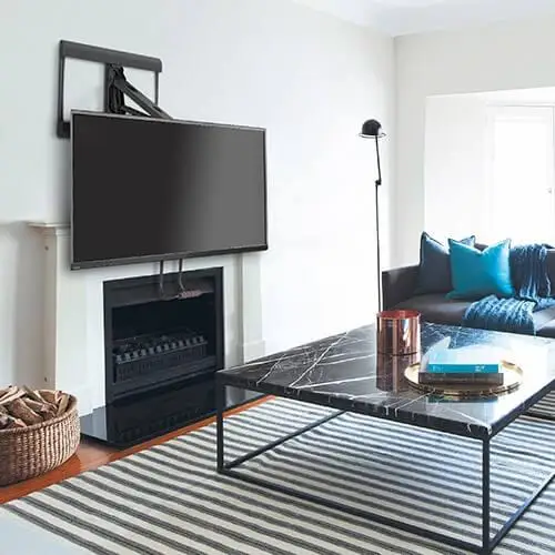fireplace feature wall with TV above on articulating arm