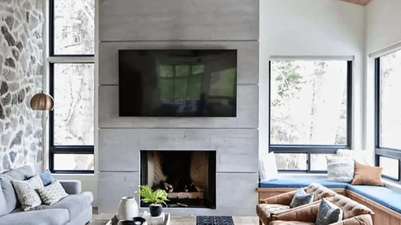 white electric fireplace mantel with tv above