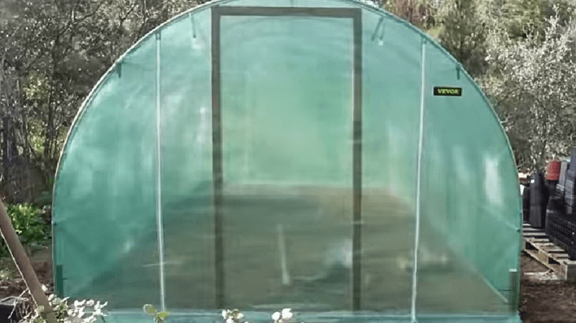 dig the holes to fix the polytunnel