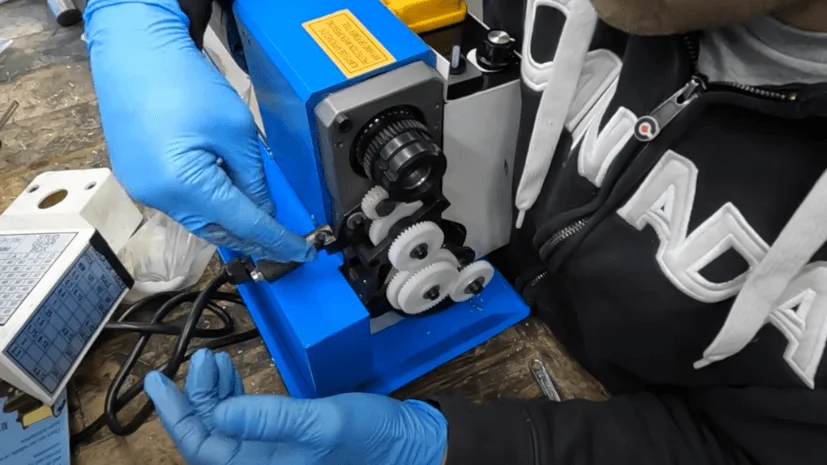 how does a lathe machine operate