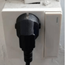 Connect the power cord to the electrical port