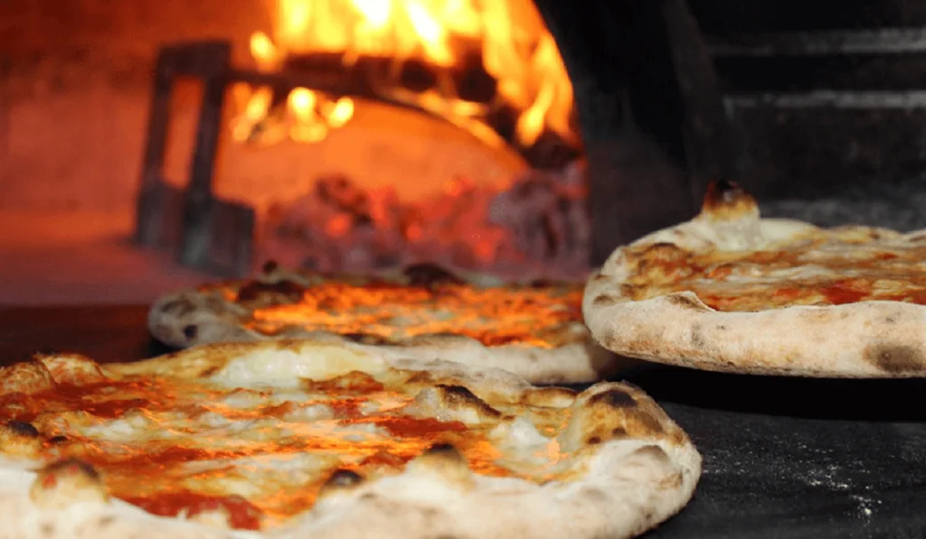how to use a wood-fired pizza oven