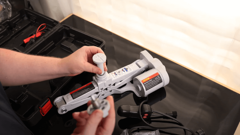 step-by-step instructions for lowering a hydraulic floor jack