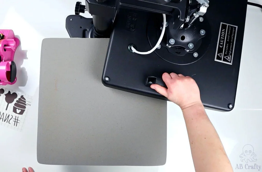 press the design with VEVOR heat press