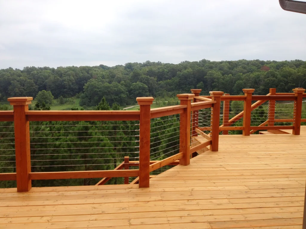 the cable deck railing with wood posts