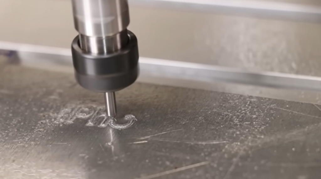 VEVOR CNC machine is cutting aluminum