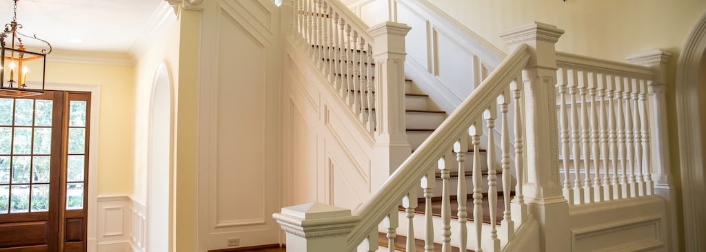 the painted staircase railing