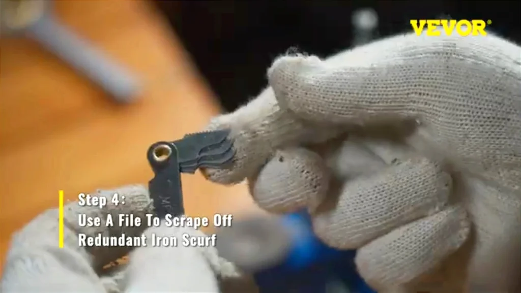 Use a file to scrape off redundant iron scurf