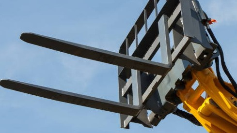 Forks attached to a tractor