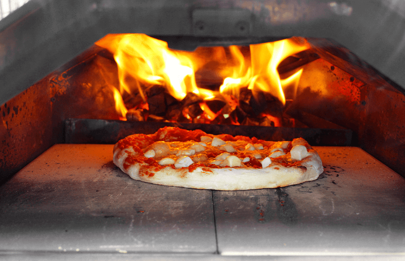 Pizza baking in an oven