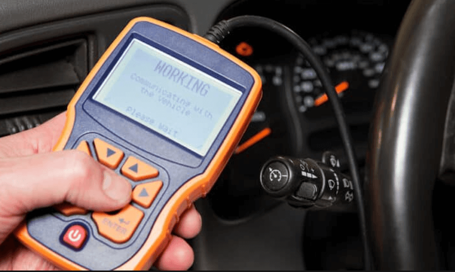 An OBD2 scanner connected to a car
